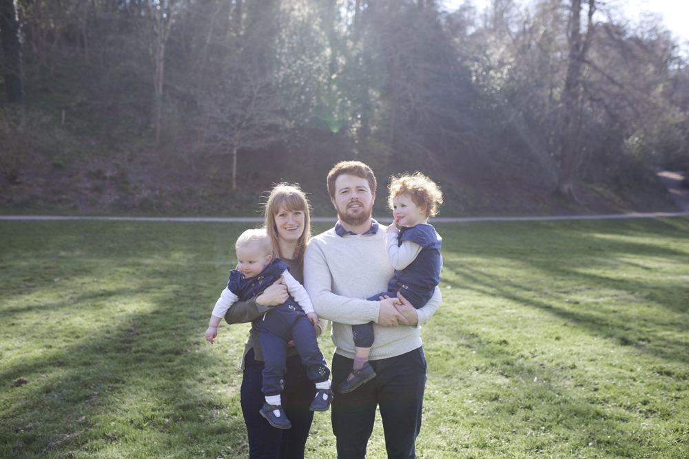 emily munday photos photography monday david munday plymouth devon cornwall family photos studio session cuddles love young toddlers matching navy blue daddy mummy