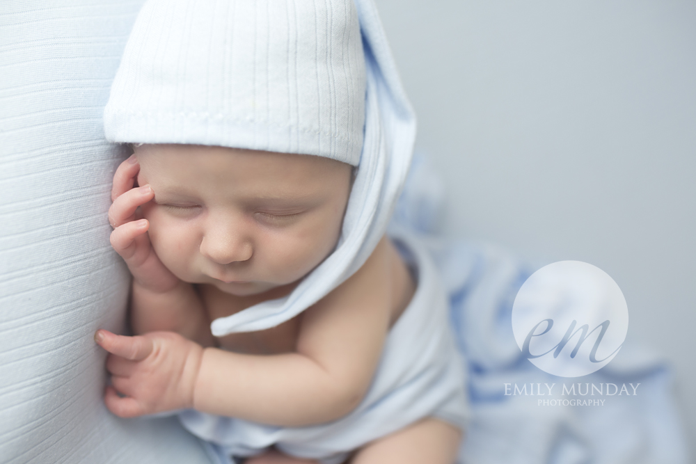  emily munday monday photography photos plymouth photo studio newborn baby session devon cornwall blue hat pixie hat sleepy 